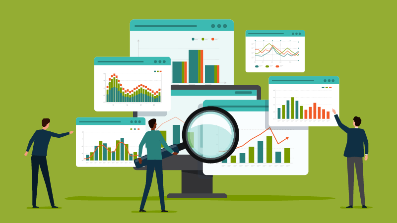 Employees analyzing business data from multiple systems